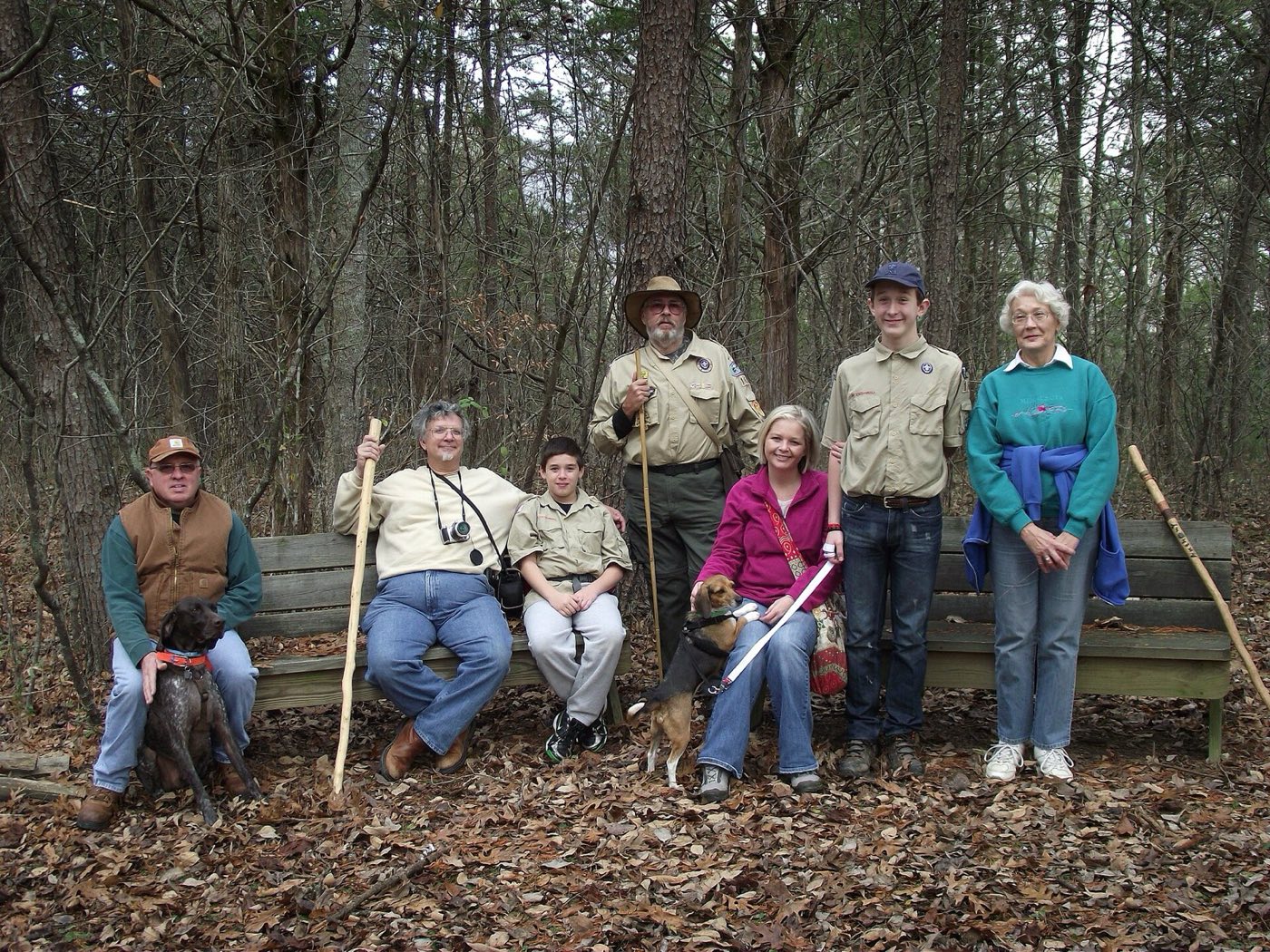 A scout troop hiking with packs